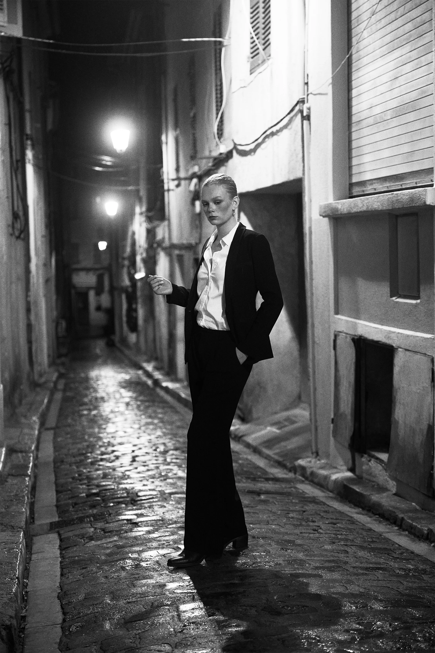 Gentaille picture from a back alley in Hyeres in southern France, a black and white picture. Helmut. Newton homage in Yves Saint Laurent.